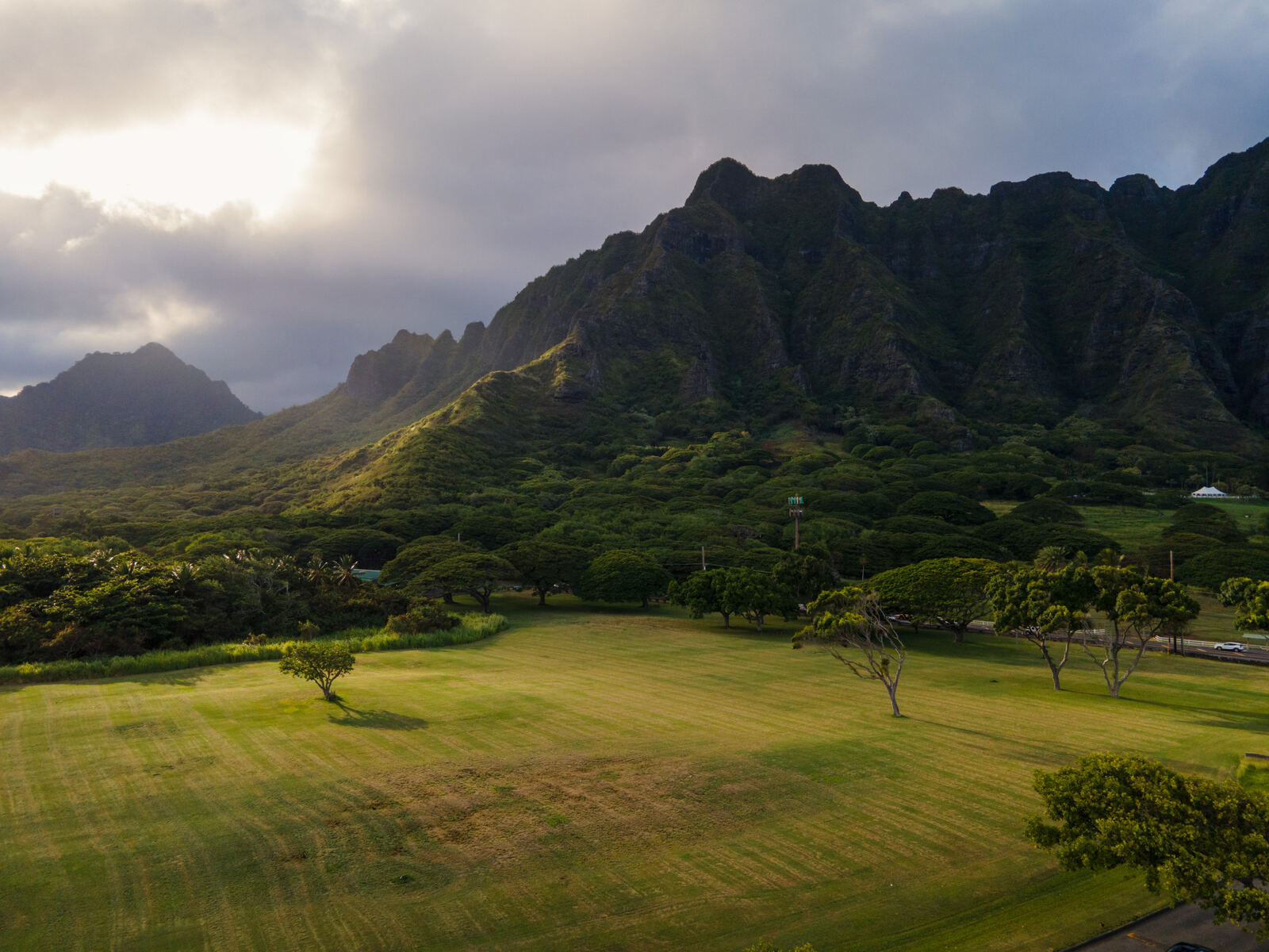Emerald cliffs above a valley field