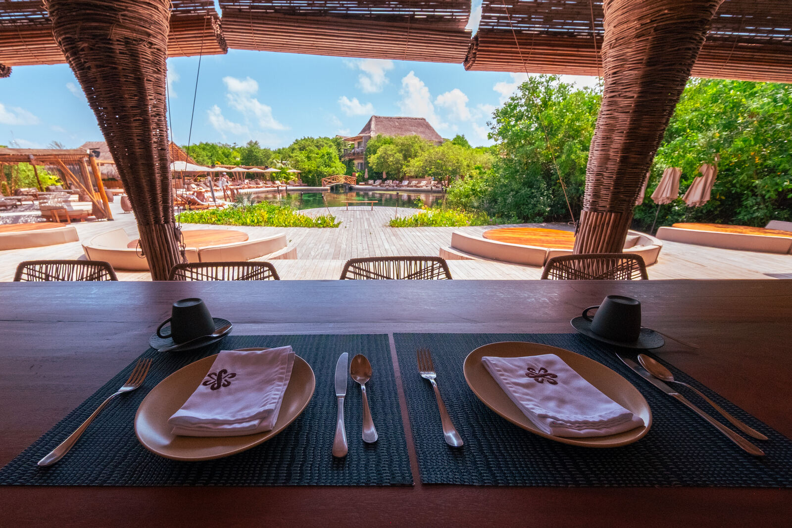 Breakfast table set above the pool deck
